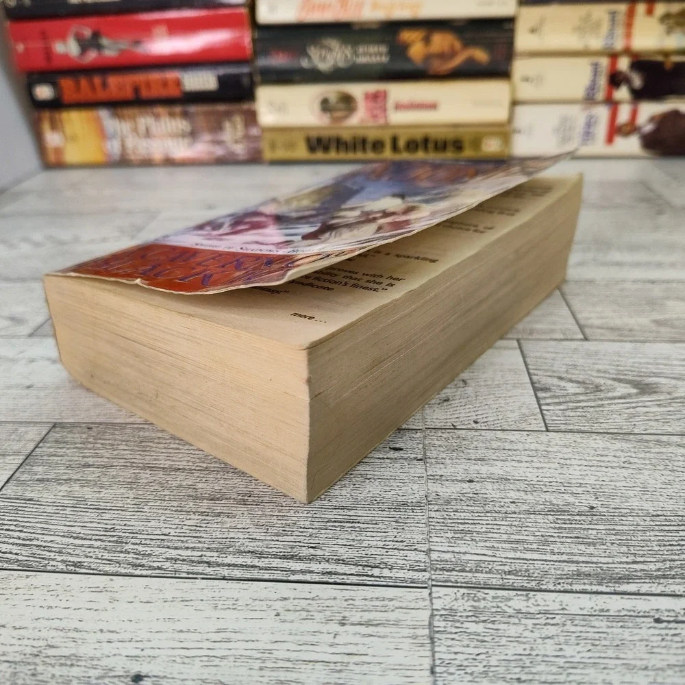 A CAVERN OF BLACK ICE JV Jones 2000 First US 11st Edition Warner Paperback‎